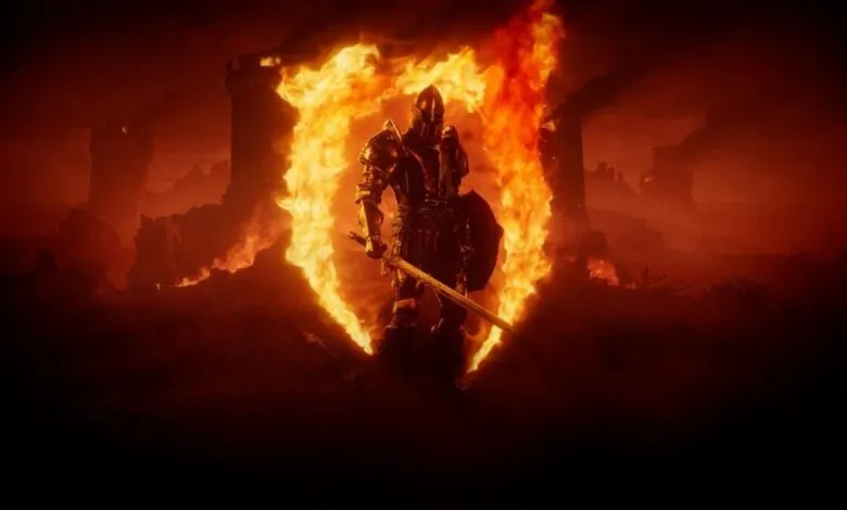 Fiery knight stands amidst burning ruins, sword drawn, engulfed in flames forming a shield shape.