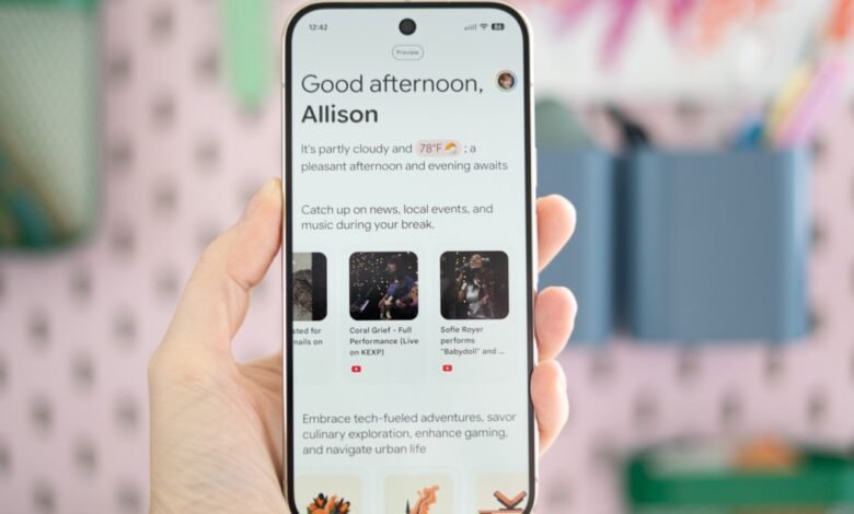 Hand holding Google Pixel phone displaying personalized weather and entertainment suggestions.