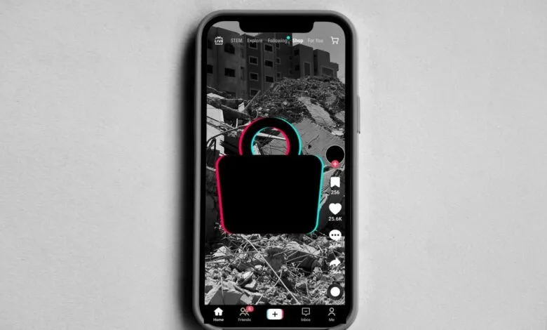 Smartphone displaying TikTok with a locked shopping bag icon over Gaza destruction.