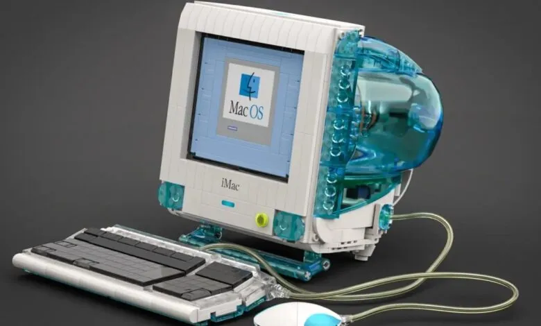 Lego recreation of an original iMac computer, featuring a translucent teal case and classic MacOS interface.