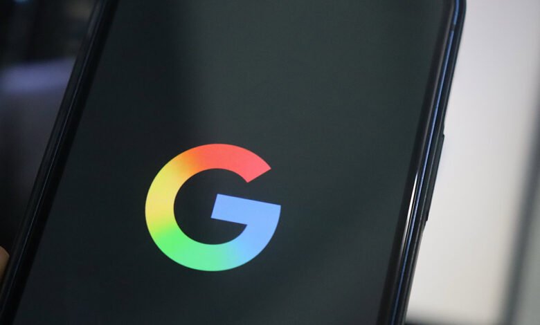 Close-up of the Google logo displayed on a smartphone screen.