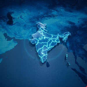 Digital map of India with glowing borders and internal divisions, set against a dark blue background.