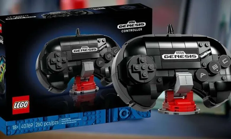 LEGO Sega Genesis controller building set, black and red, displayed with box.