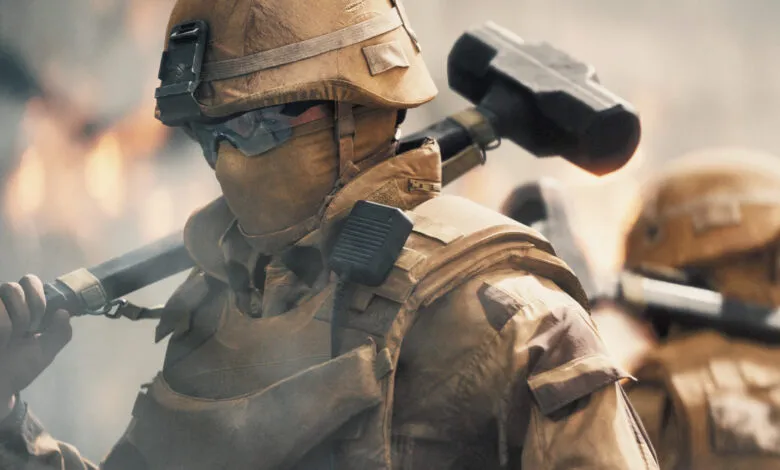 Close-up of a soldier carrying a sledgehammer, amidst a smoky battlefield.