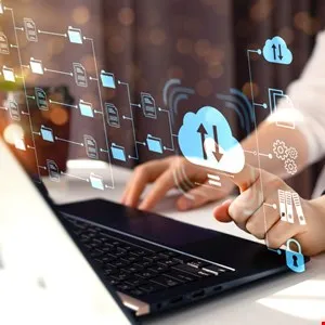 Person using a laptop with cloud storage and file management graphics overlayed.