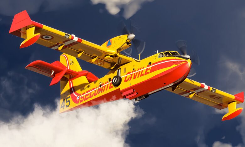 A bright yellow and red Canadair CL-415 firefighting aircraft in flight.