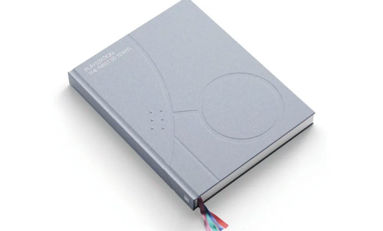 A light gray hardcover book titled 'Playstation: The First 30 Years' with embossed design.