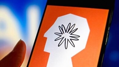 Anthropic AI logo displayed on a smartphone screen, a stylized head with a flower-like design.