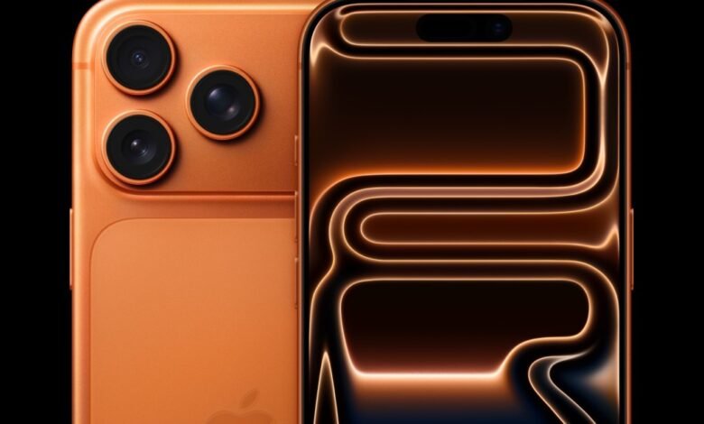 Close-up of a cosmic orange iPhone 17 Pro, showcasing its triple-lens camera and unique back design.