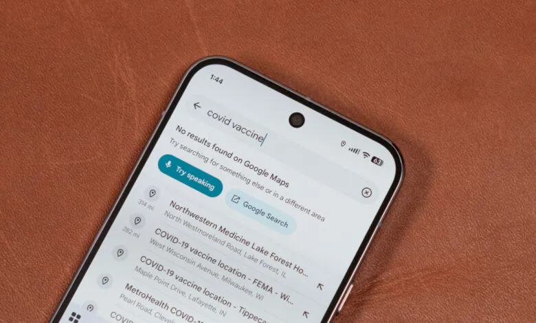 Smartphone displaying a Google Maps search for COVID-19 vaccine locations, showing no results found.