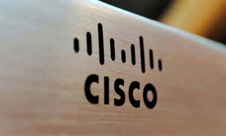 Close-up of the Cisco logo and name etched into a light-colored surface.