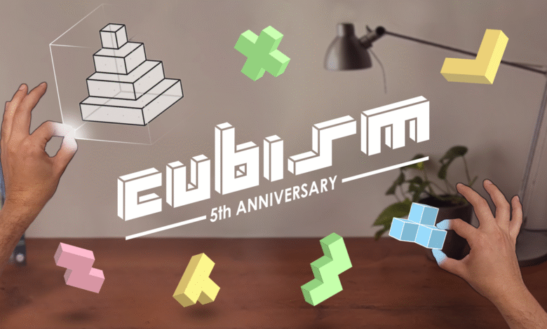 Cubism 5th Anniversary: Hands interact with 3D geometric shapes and logo.