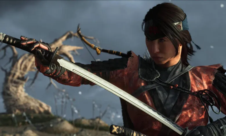 A female samurai warrior in red armor draws her katana, ready for battle.