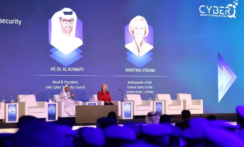 Dr. Al Kuwaiti and Ambassador Martina Strong speak at a cybersecurity conference.
