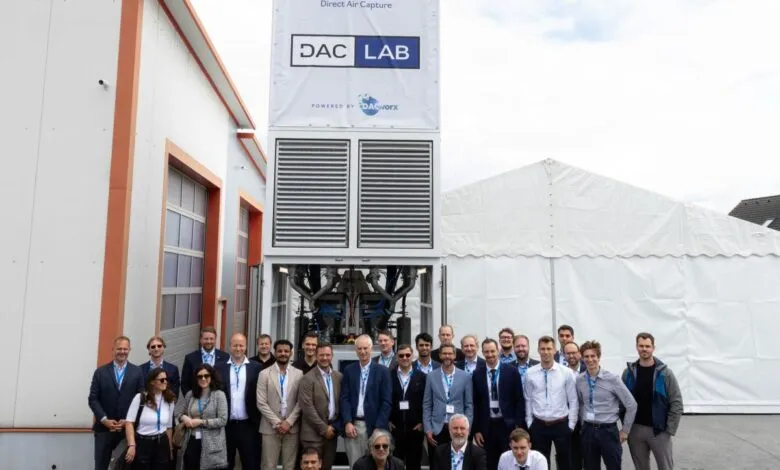 DAC Lab team poses proudly before their direct air capture technology.