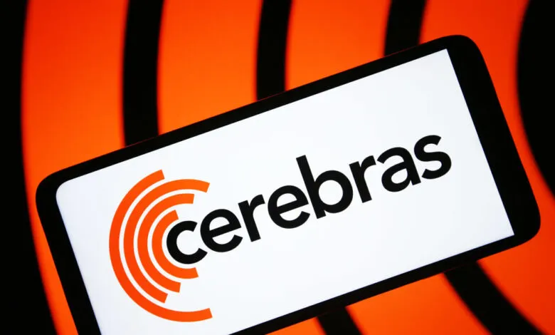 Cerebras Systems logo displayed on a smartphone screen against an orange and black background.