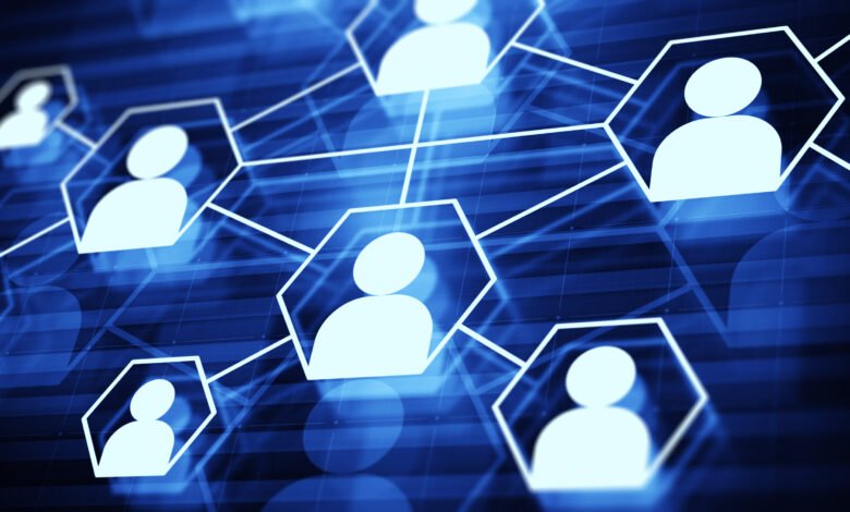Abstract network graphic showing connections between people, represented by white icons within blue hexagons.