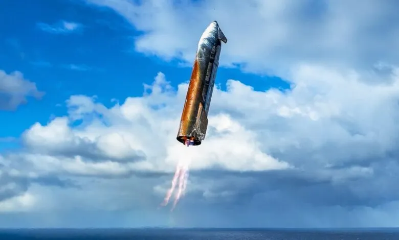 Rocket booster descending through a cloudy sky, flames visible from its engine.