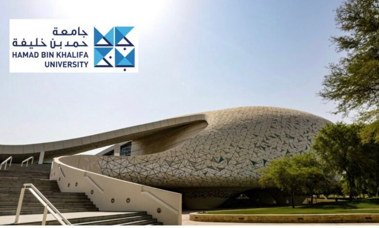Hamad Bin Khalifa University building with modern architecture and logo.