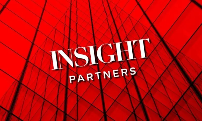 Insight Partners logo displayed prominently against a bold red glass building backdrop.
