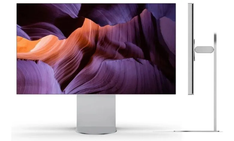 Modern monitor displaying a colorful canyon landscape