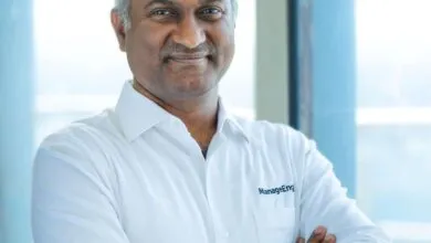 Nirmal Kumar Manoharan, Vice President of Revenue Operations at ManageEngine, smiles with arms crossed.