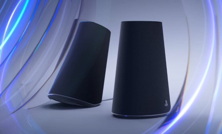 Two dark grey cylindrical speakers with the PlayStation logo, set against a backdrop of swirling blue and white light.