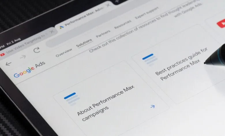 Close-up of a tablet screen displaying Google Ads Performance Max campaign resources.