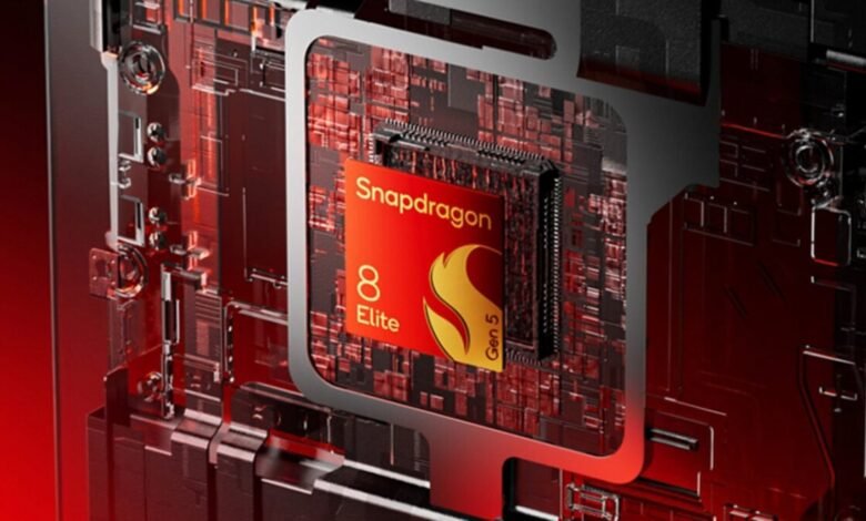Close-up of a Qualcomm Snapdragon 8 Elite Gen 5 processor chip with red and black circuitry.