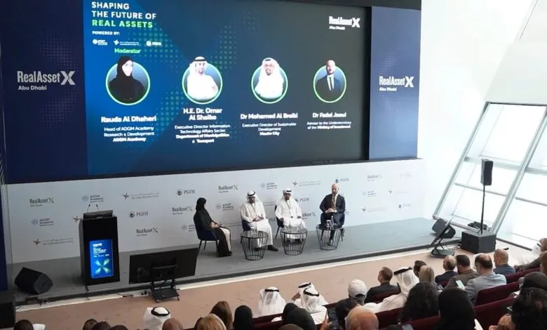 Panel discussion at RealAssetX Abu Dhabi conference on the future of real assets, featuring prominent speakers.