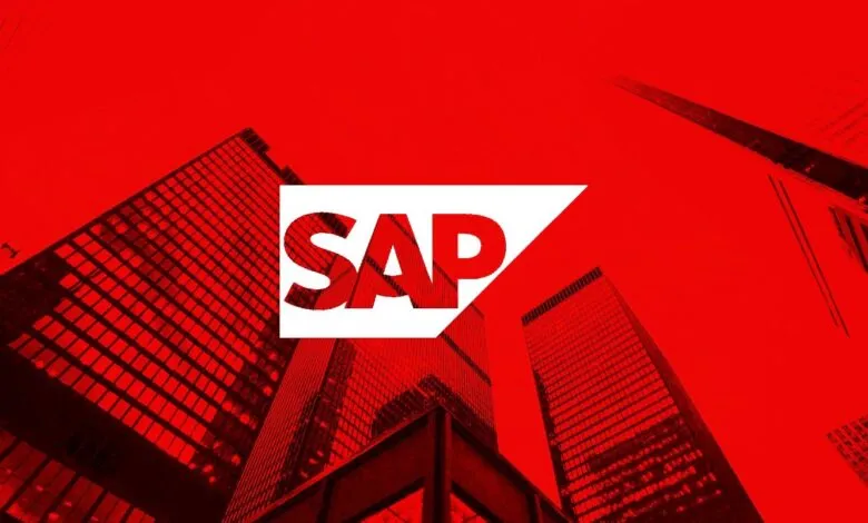 SAP logo superimposed on a red cityscape, symbolizing business and technology.