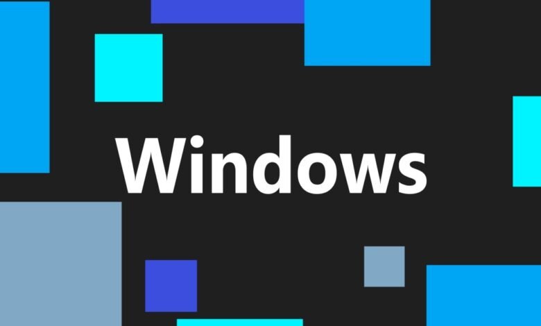 The word 'Windows' in white text against a dark background with colorful geometric shapes.
