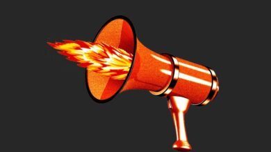 Orange megaphone emitting flames, symbolizing passionate speech or fiery debate.