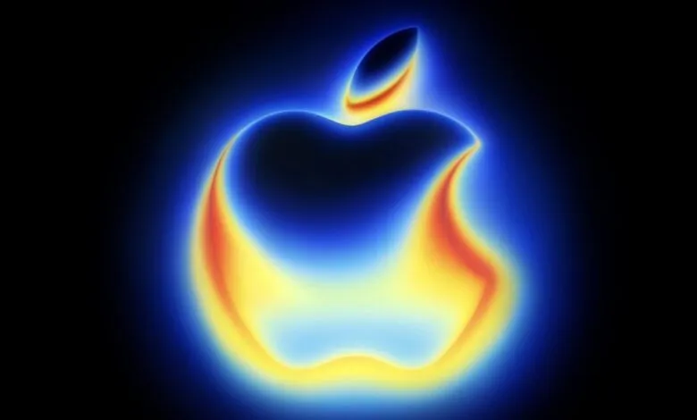 Stylized Apple logo rendered in vibrant blue, orange, and yellow hues, resembling a fiery glow.