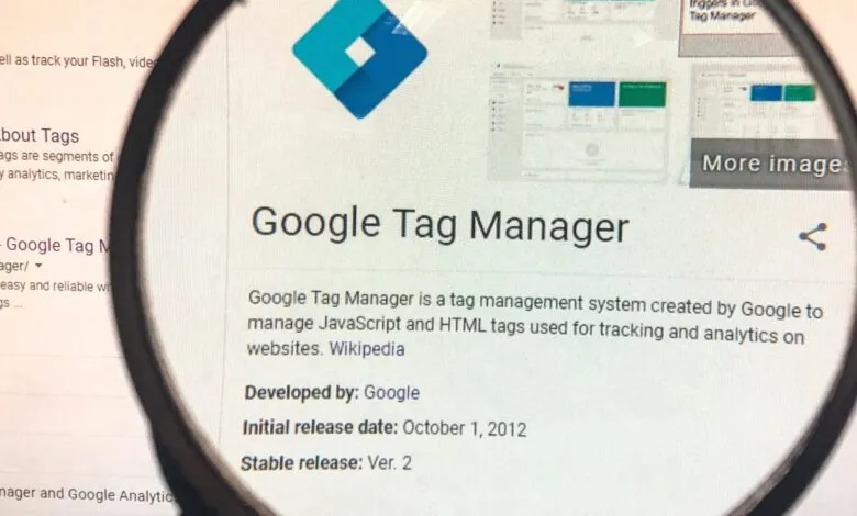 Close-up of a computer screen showing the Google Tag Manager interface and information about its features.