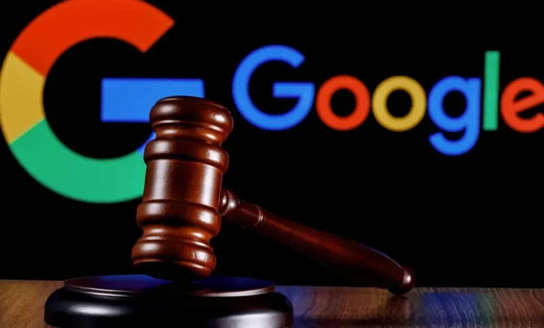 Judge's gavel in focus with blurred Google logo in background, symbolizing legal action against Google.