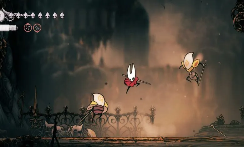 Hornet in mid-air, attacking enemies in Hollow Knight: Silksong.