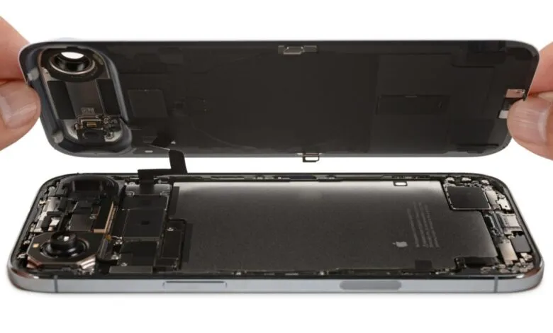 iPhone back cover being removed, revealing internal components like battery and camera.