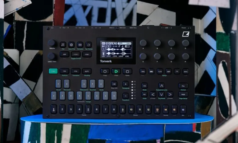 Tonverk synthesizer, a dark gray music production device with a teal accent, displayed against an abstract art backdrop.