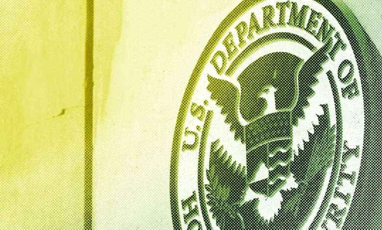 Close-up of the U.S. Department of Treasury seal in green and yellow tones.