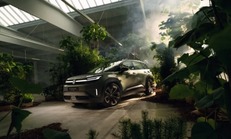 VW ID. CROZZ in a lush, indoor jungle setting.