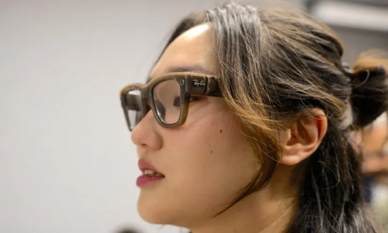 Close-up of a person wearing Ray-Ban smart glasses.