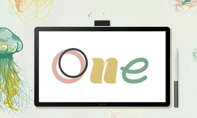 Wacom One creative pen display with stylus, showcasing pastel-colored 'One' logo against a jellyfish-themed background.