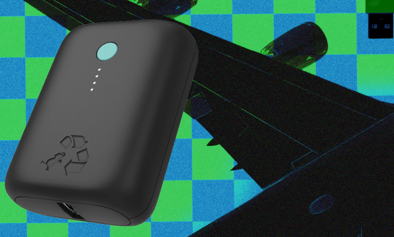 A black power bank with a recycling symbol and a small animal silhouette.