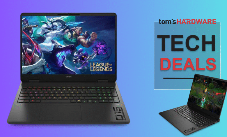 Two black gaming laptops displaying League of Legends gameplay. Tom's Hardware Tech Deals banner.