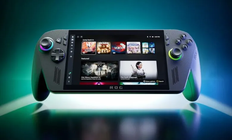 Close-up of a grey handheld gaming console with a vibrant touchscreen display.