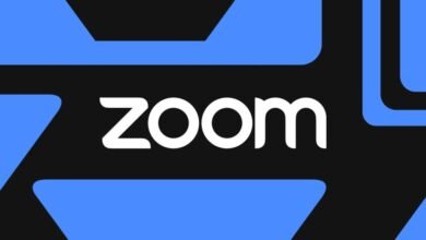 Zoom logo on a black and blue background. The Zoom wordmark is in white.