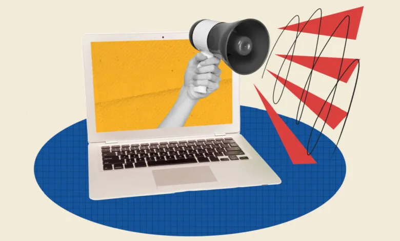 A hand holding a megaphone emerges from a laptop screen, broadcasting sound waves.