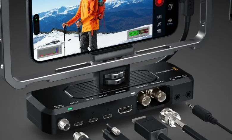 Blackmagic Design video device with smartphone mount, cables, and ports; ideal for mobile filmmaking.