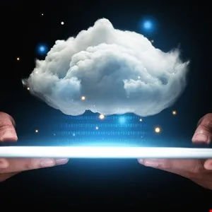 Cloud computing concept: Hands hold a tablet displaying a digital cloud with binary code.